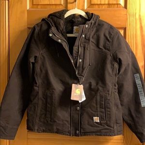 Woman’s Carhartt sherpa lined jacket. Size XS